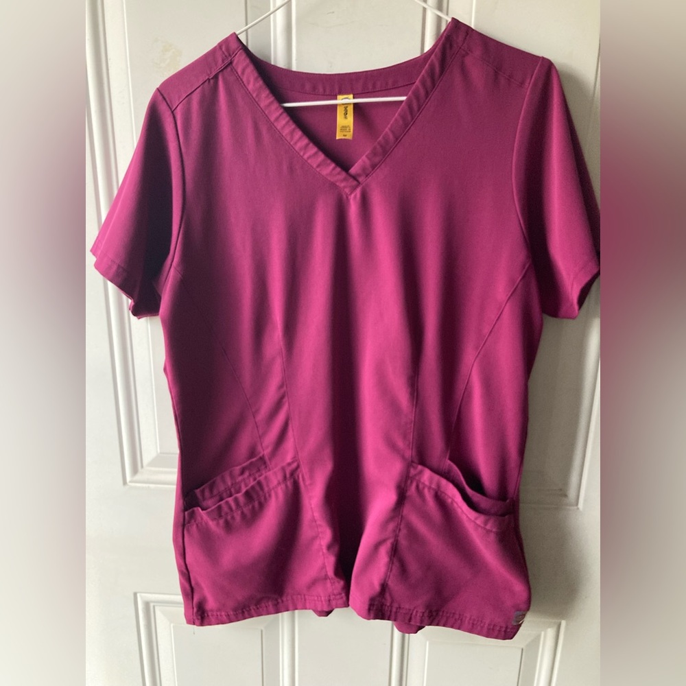 Woman’s maroon WonderWink scrub top size M